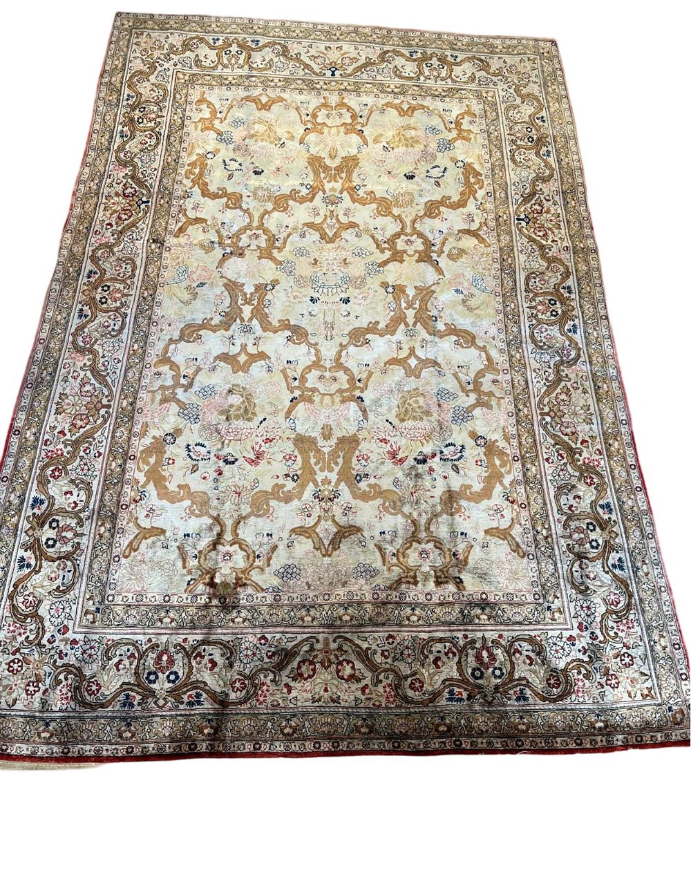 Lot 75: An Extremely Fine Persian Qum Silk Rug.