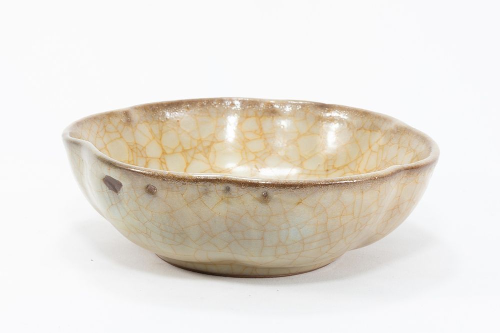 Lot 79: A Chinese Beige Crackled Porcelain Bowl.