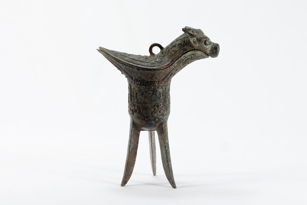 Lot 82: A Chinese Bronze Oil Lamp in the Shape...