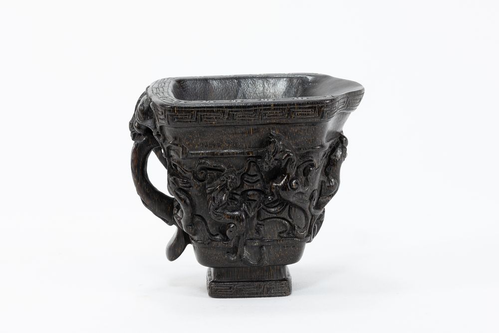 Lot 88: A Chinese Horn Libation Cup Decorated with Dragons...