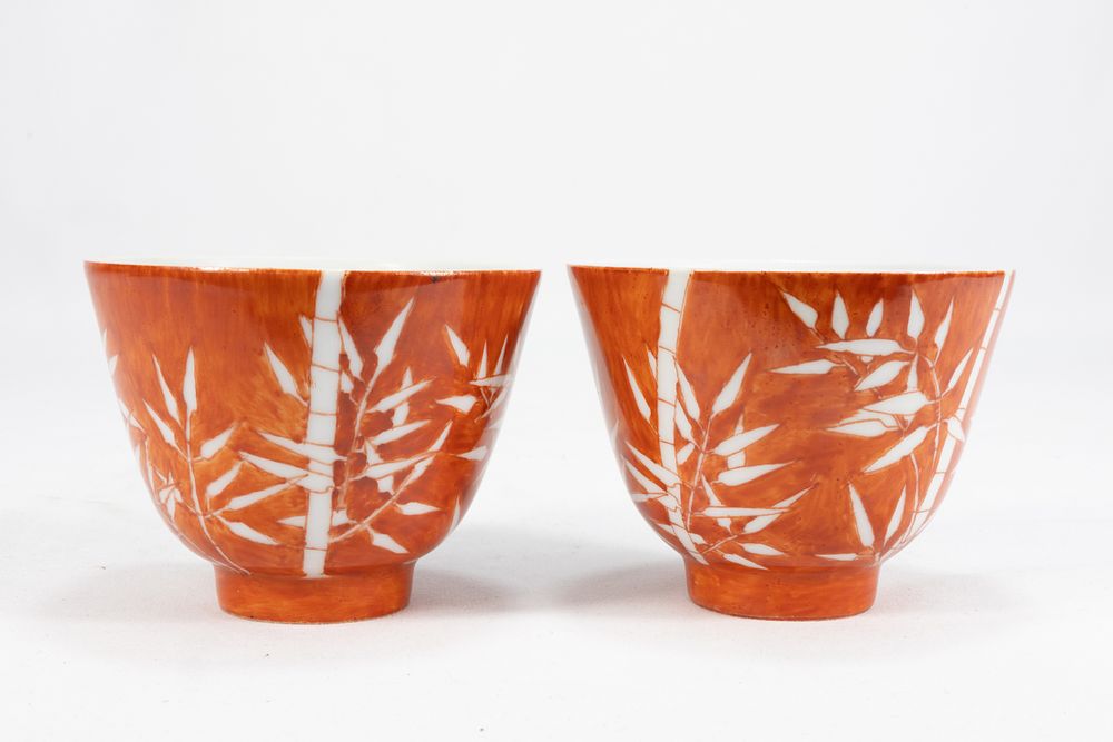 Lot 121: A Pair of Chinese Coral Ground Porcelain Bowls...