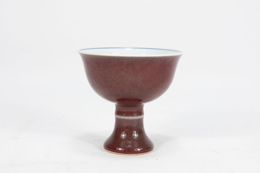 Lot 126: A Chinese Red Coral Glazed Porcelain Stem Cup...