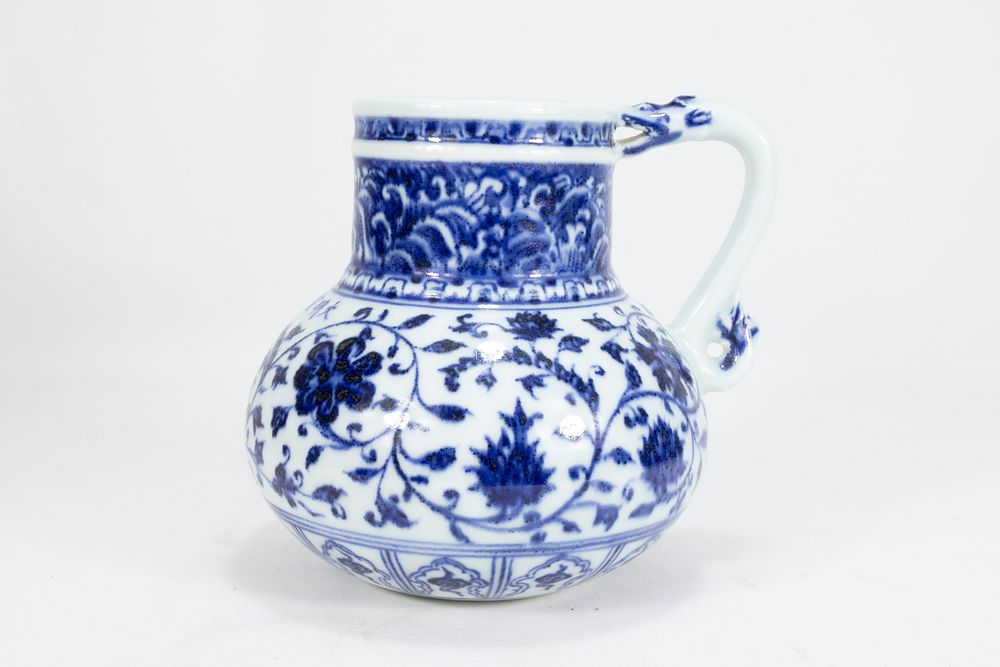 Lot 127: A Chinese Blue & White Porcelain Jug Decorated...