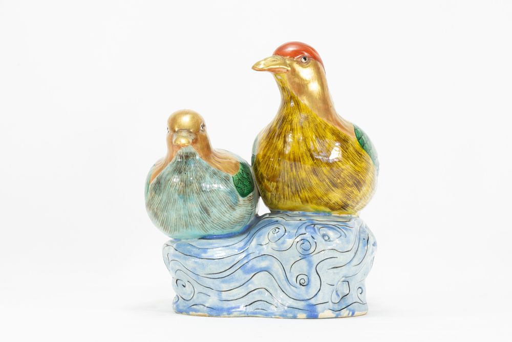 Lot 136: A Pair of Chinese Porcelain Figures of Ducks...