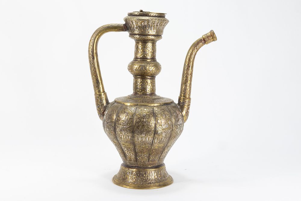 Lot 147: An Islamic Khorasan Style Brass Ewer Aftaba with...