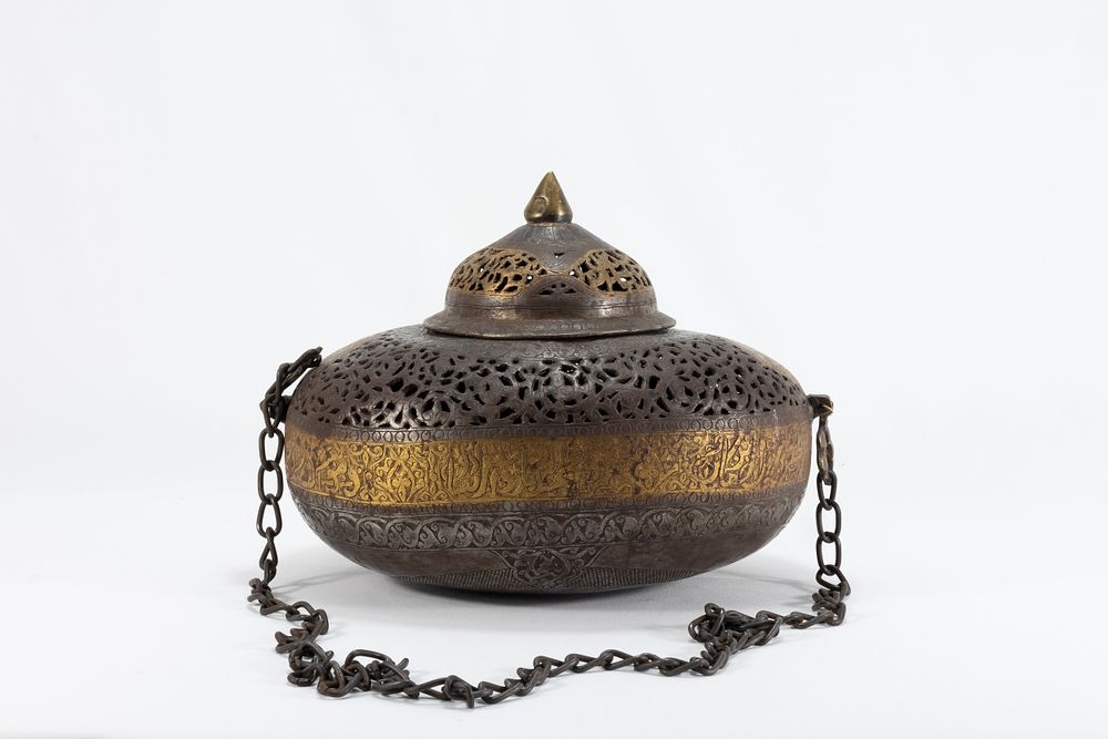 Lot 150: An Islamic Iron Lidded Kashkul Decorated with Gilt...