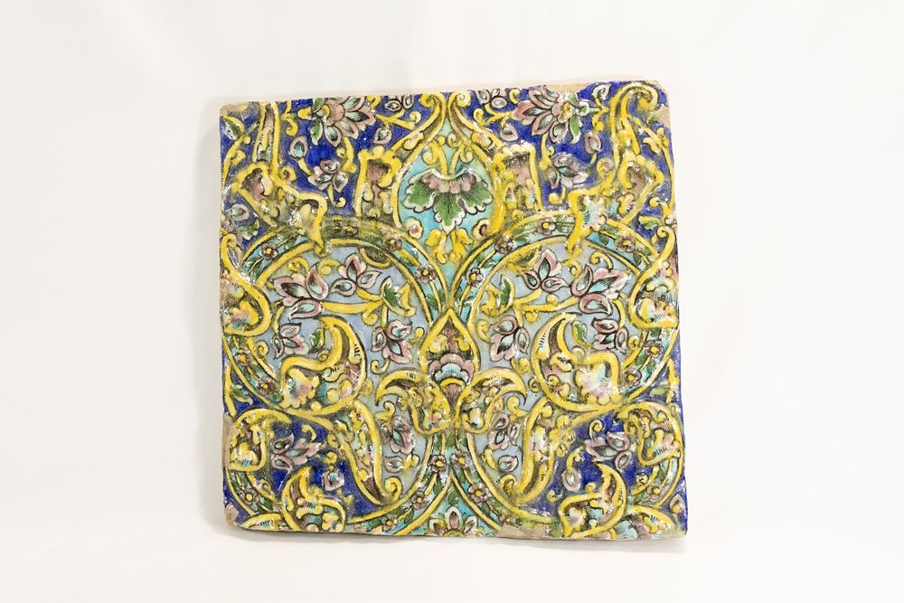 Lot 162: An Islamic Persian Tile Depicting Floral Patterns from...