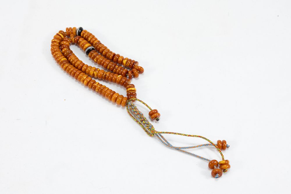 Lot 193: An Islamic Butterscotch Amber Prayer Beads Tasbih Containing...