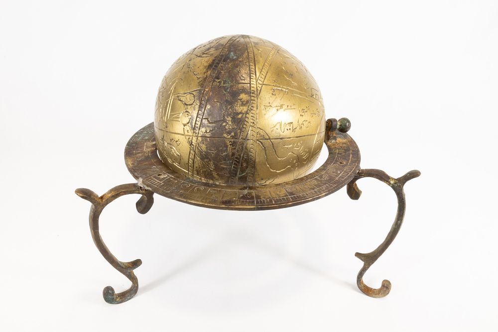 Lot 203: An Islamic Indian Late Mughal Brass Globe with...