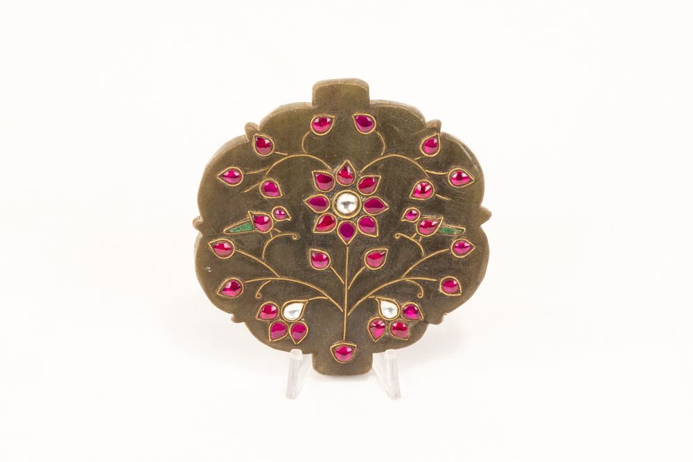 Lot 246: An Indian Mughal Green Jade Pendant Decorated with...