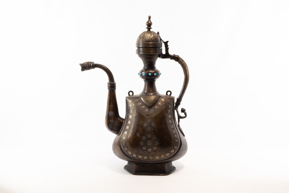 Lot 265: An Islamic Indian Bronze Water Jug Decorated with...
