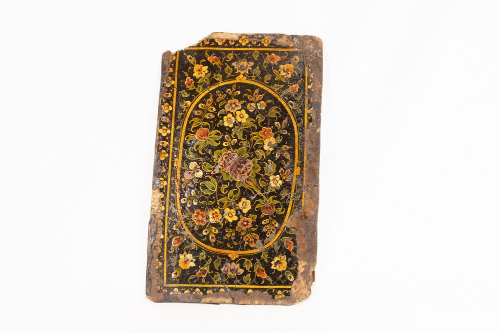 Lot 272: An Indian Kashmiri Paper-Mache Book Cover Decorated with...