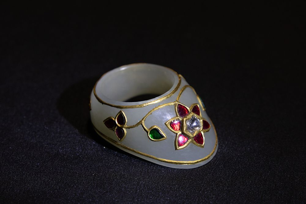 Lot 297: An Indian Mughal Jade Archer Ring Decorated with...