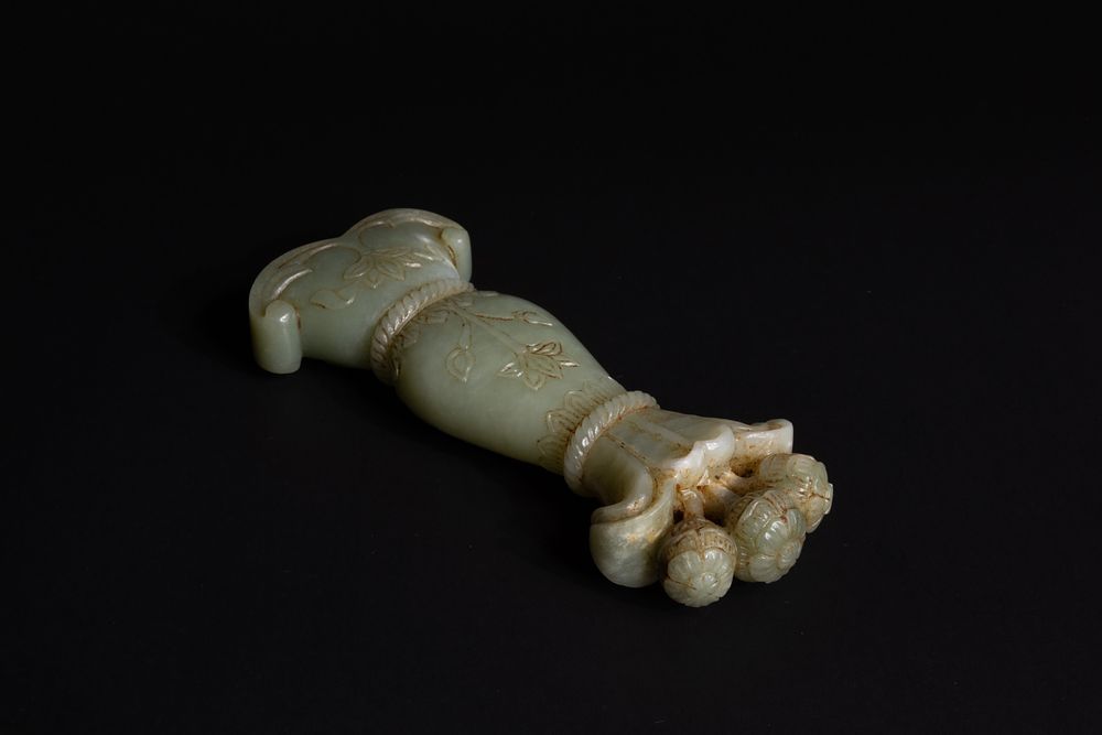 Lot 299: An Indian Mughal Jade Handle Carved with Floral...