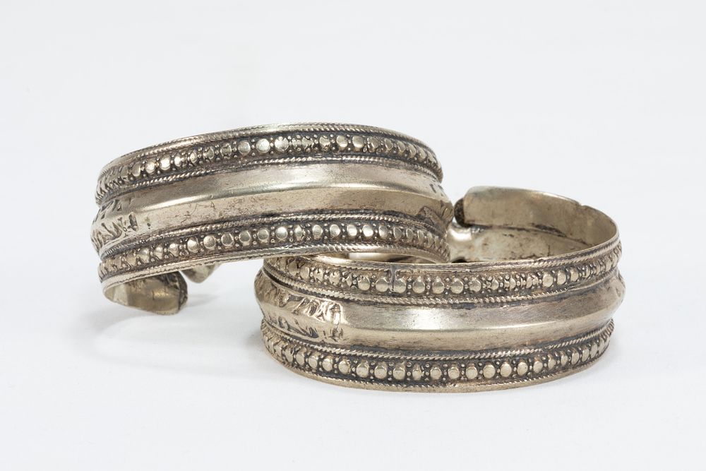 Lot 314: A Pair of Tribal Afghan Silver Bracelets.
