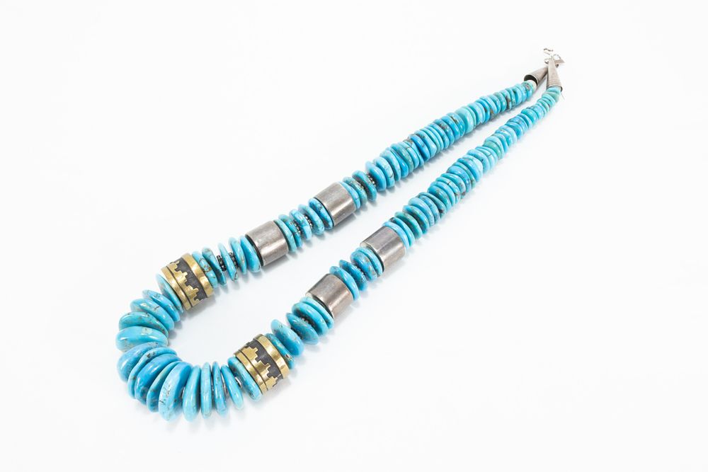 Lot 328: A South American Turquoise & White Metal Beaded...