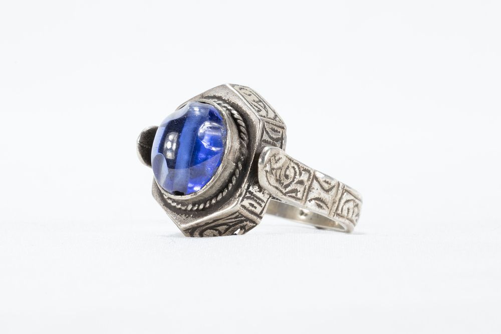 Lot 332: A Blue Gemstone Ring Set on Silver Possibly...
