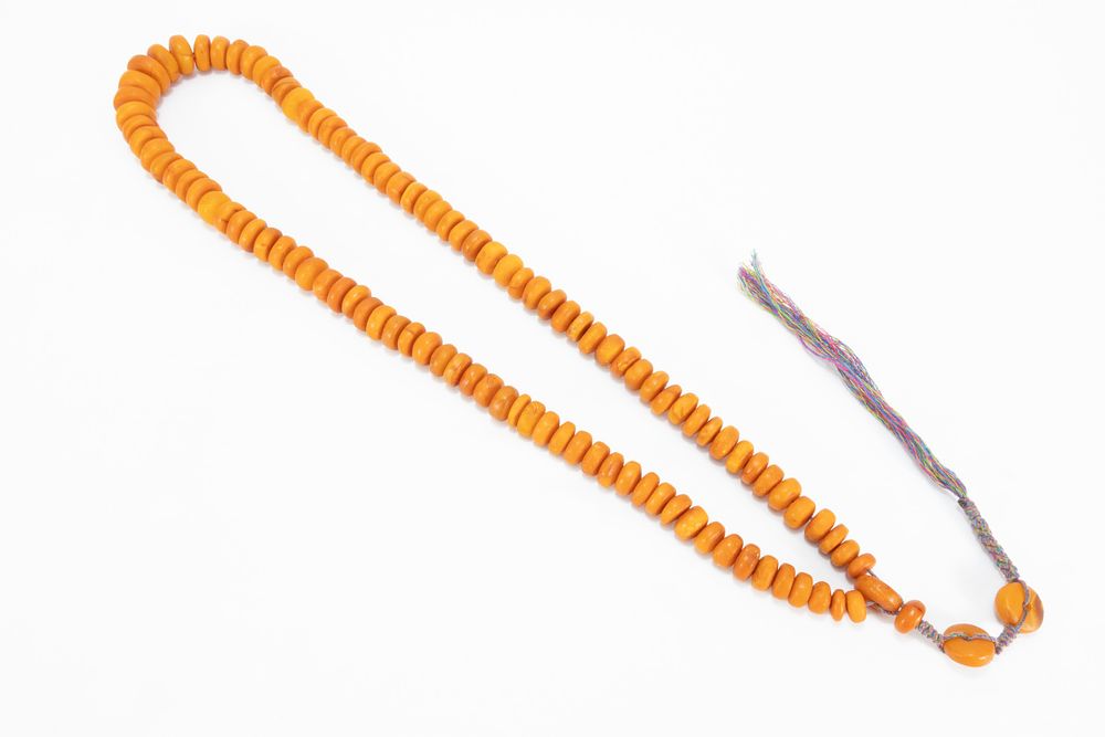 Lot 333: A Tribal Moroccan Berber Single Strand Graduated Butterscotch...