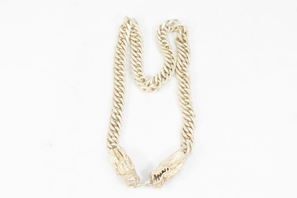 Lot 345: A Large Chinese White Metal Necklace Depicting Dragons...