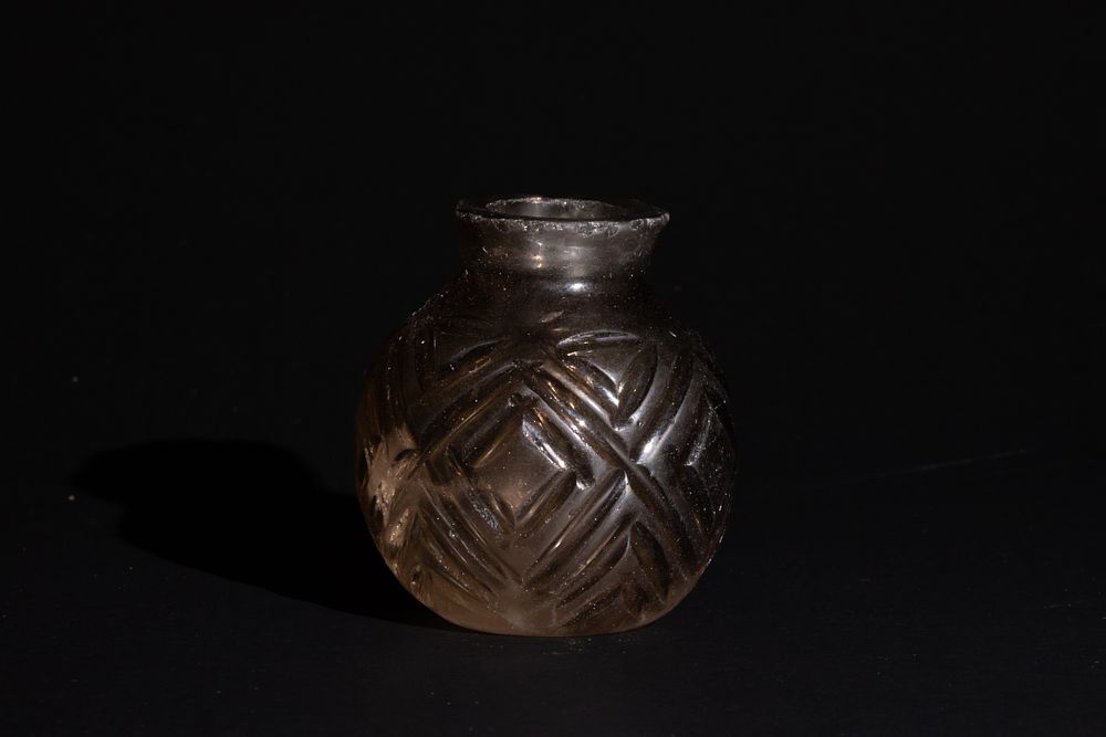 Lot 108: A Rare Islamic Carved Crystal Bottle Possibly Fatimid