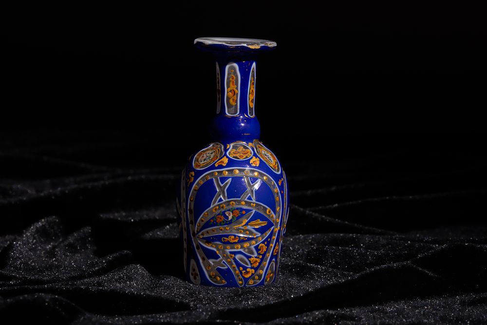 Lot 117: A Bohemian Enamelled Blue Glass Perfume Bottle, Made...