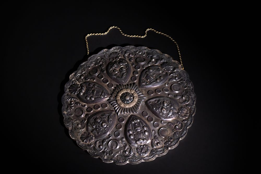 Lot 130: An Islamic Ottoman Silver Mirror Decorated with Floral...