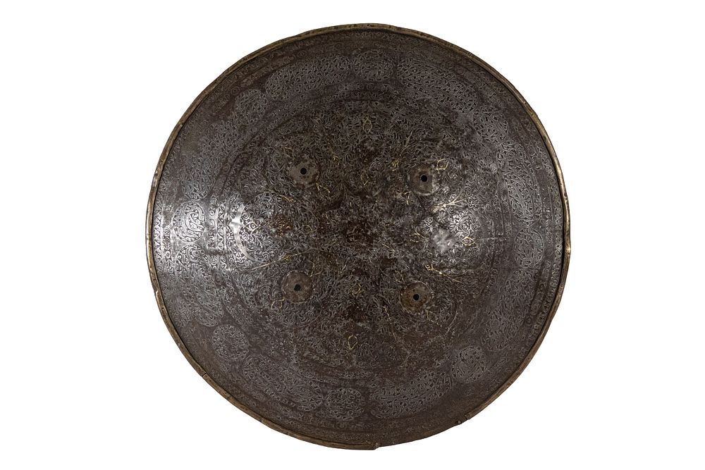 Lot 155: An Islamic Qajar Steel Shield Decorated with Engravings...