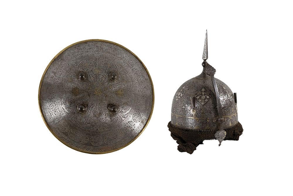 Lot 156: An Islamic Qajar Gold Damascened Steel Helmet and...