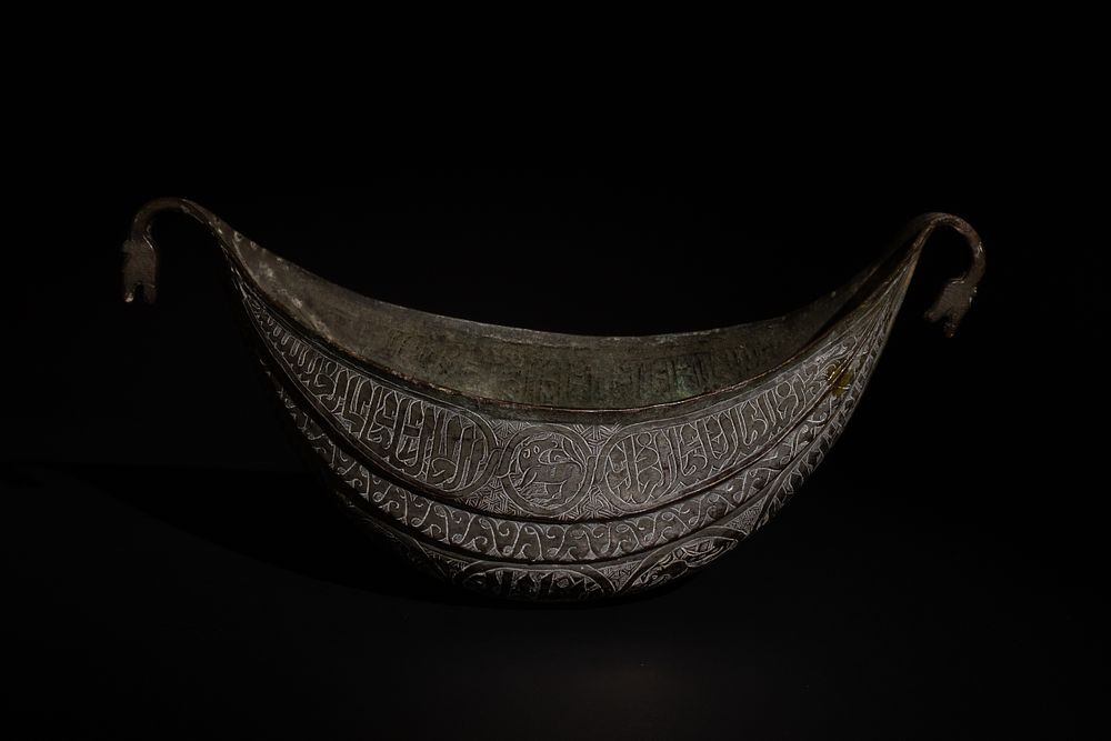 Lot 157: An Islamic Indian Kashmiri Copper Kashkul Beggar's Bowl...