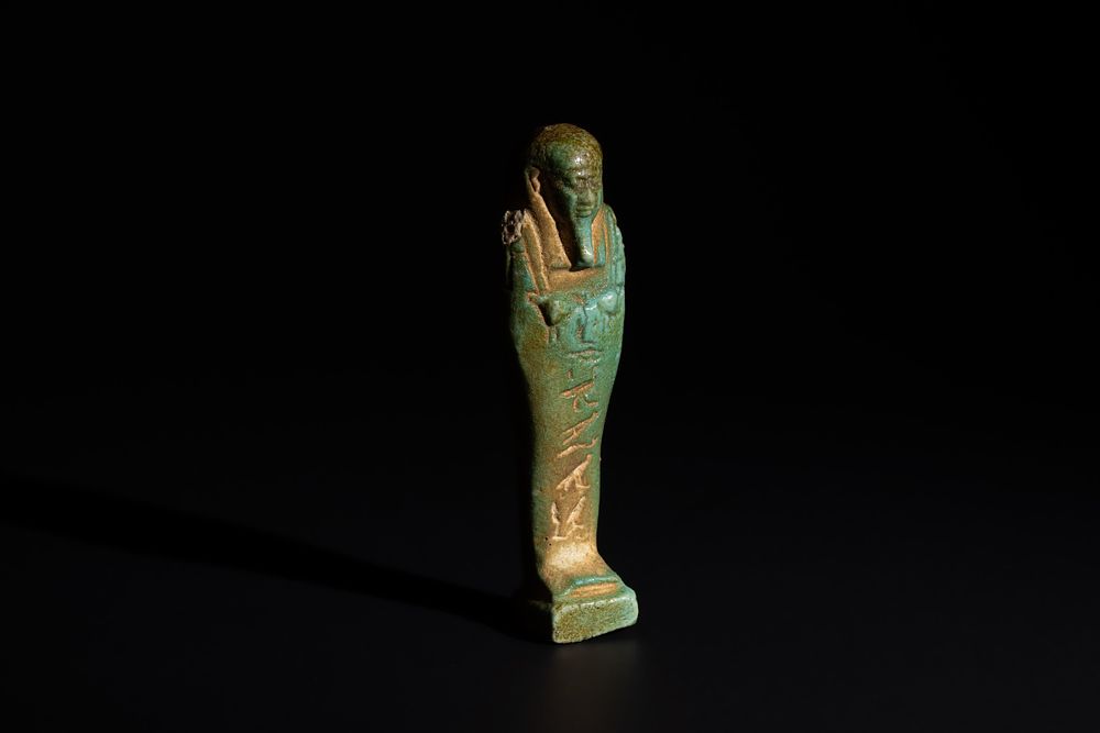 Lot 168: An Egyptian Blue Glazed Faience Ushabti Circa Early...
