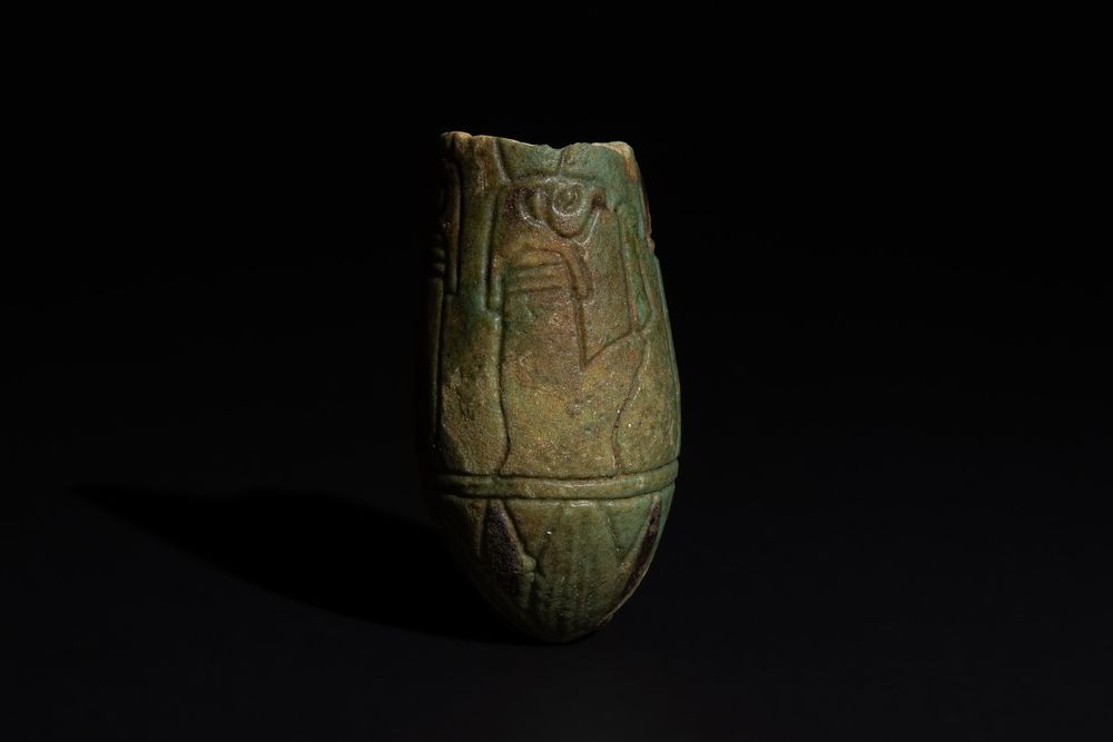 Lot 169: An Egyptian Blue Glazed Faience Fragment of a...