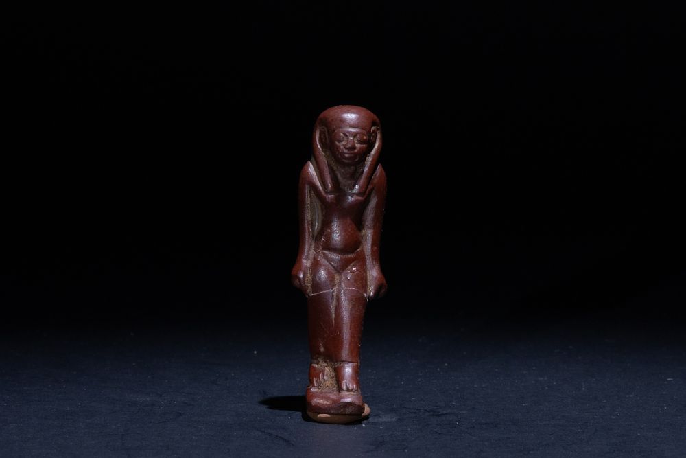 Lot 170: An Egyptian Red Jasper Amulet Inscribed with Hieroglyphs...