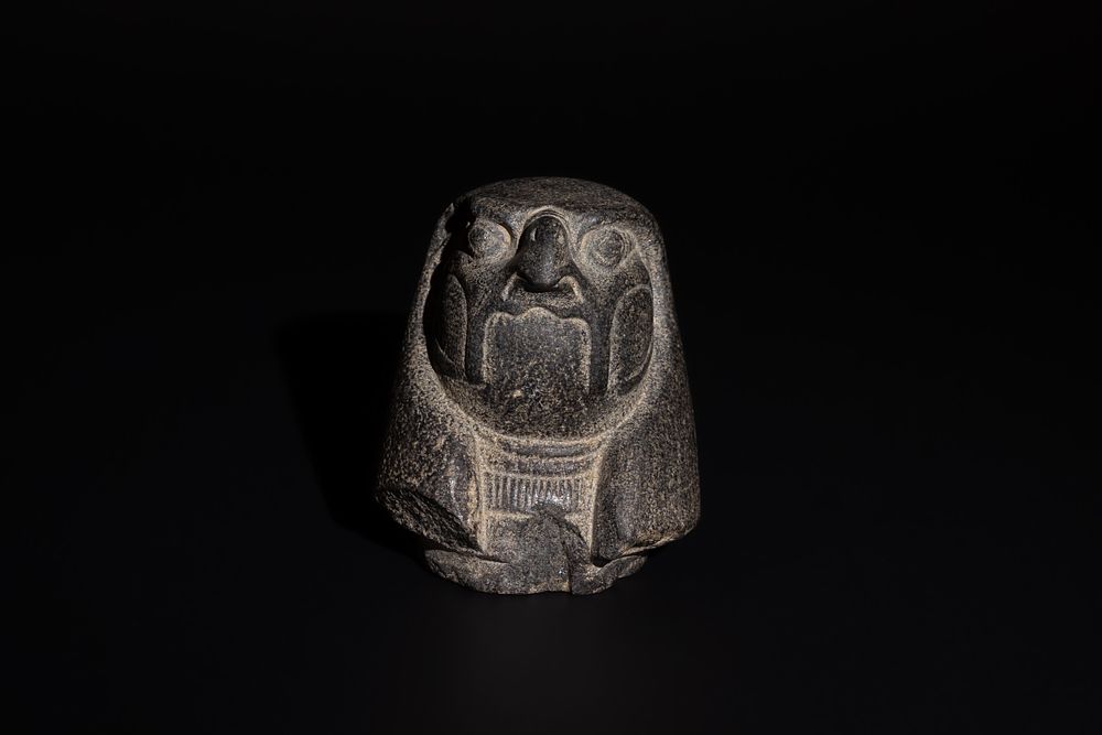 Lot 177: An Egyptian Canopic Jar Lid in Granite in...