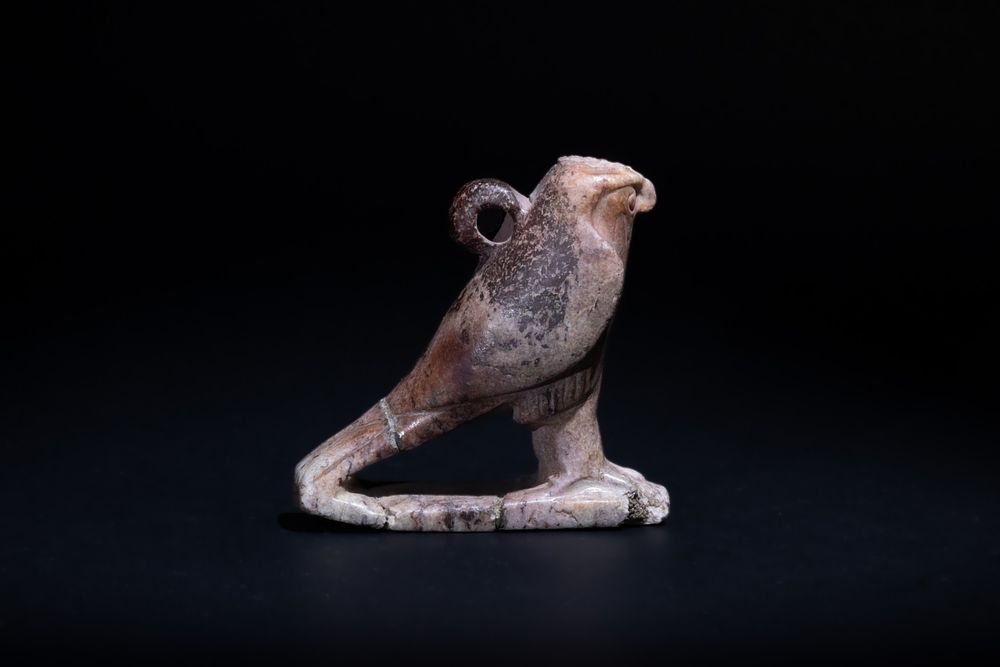 Lot 178: An Egyptian Marble/ Hardstone Horus Pendant as a...