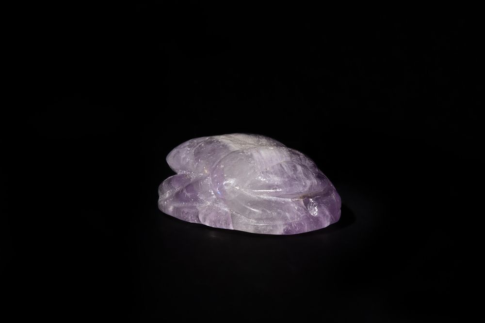 Lot 179: An Egyptian Amethyst Scarab, Hellenistic Period of Egypt...