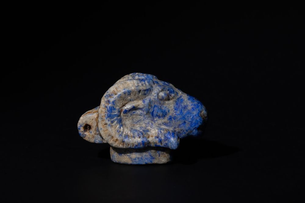 Lot 180: An Egyptian Lapis Lazuli Ram Head Pendant, New...