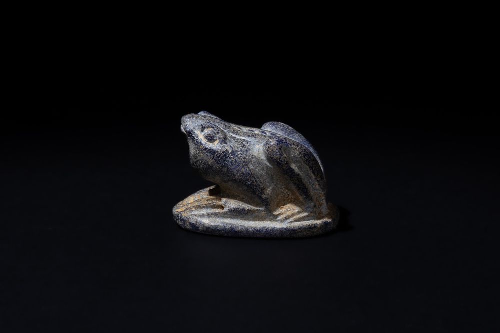 Lot 185: An Egyptian Lapis Lazuli Seated Frog Amulet, Inscribed...