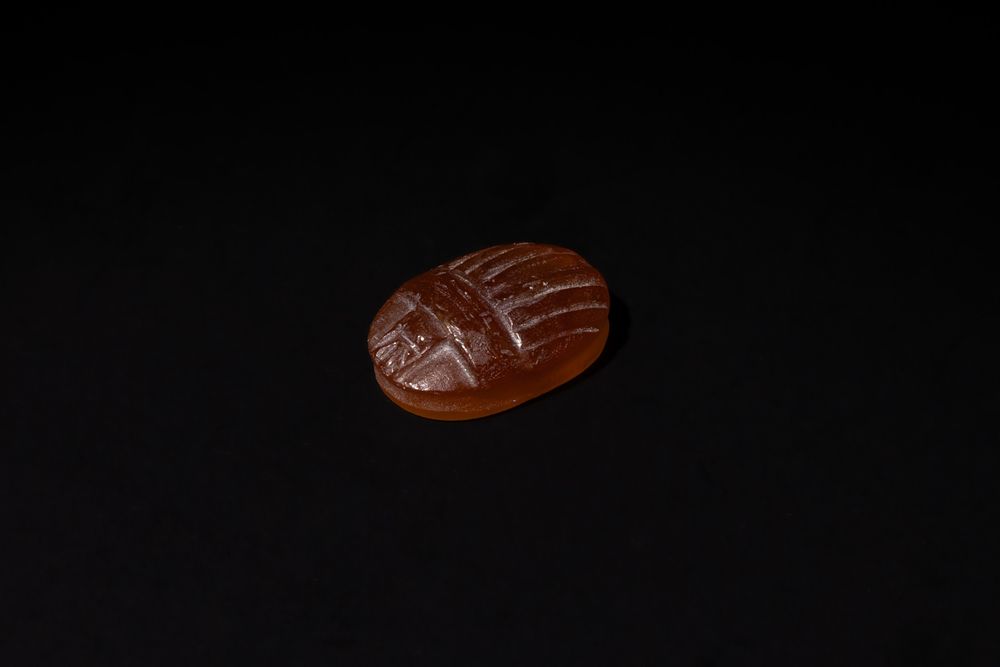 Lot 193: An Egyptian Style Agate Scarab Amulet.