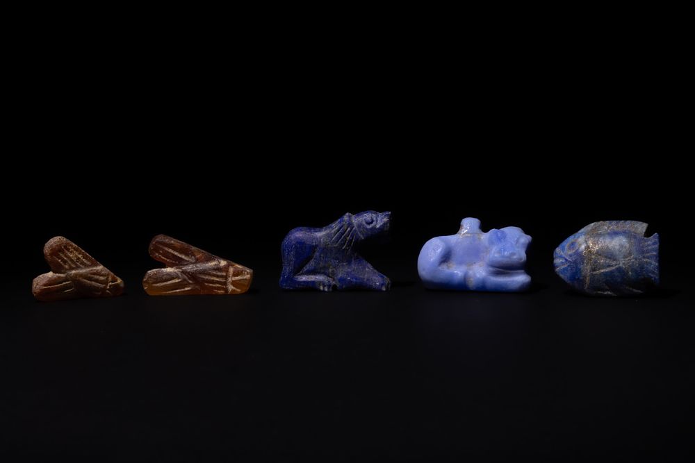 Lot 199: A Mixed Lot of Egyptian Amulets, Consisting of...