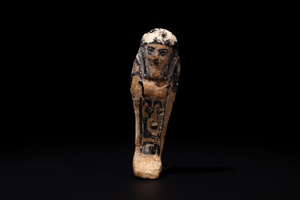 Lot 203: An Egyptian Faience Miniature Ushabti with Inscriptions of...