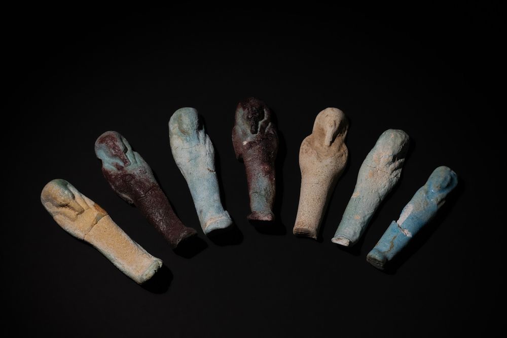 Lot 205: A Lot of 7 Egyptian Miniature Faience Ushabtis,...