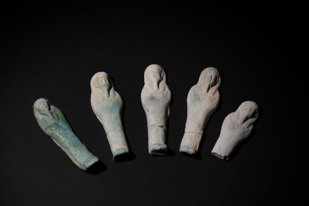 Lot 206: A Lot of 5 Egyptian Miniature Faience Ushabtis,...