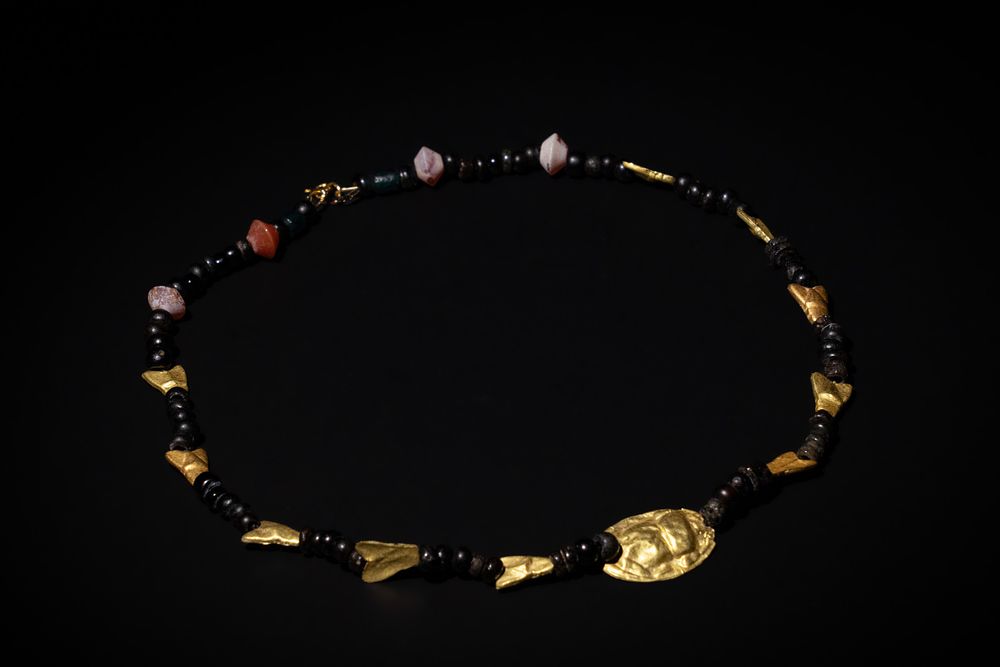 Lot 207: An Egyptian Necklace Consisting of Different Period Beads...