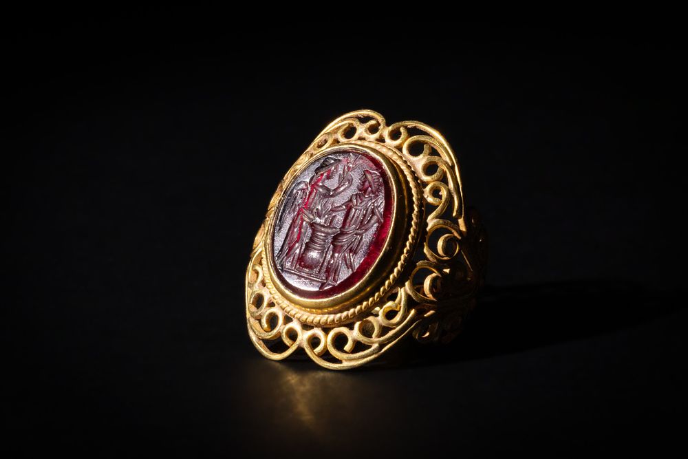 Lot 212: A Gold Ring with Intaglio Depicting a Standing...