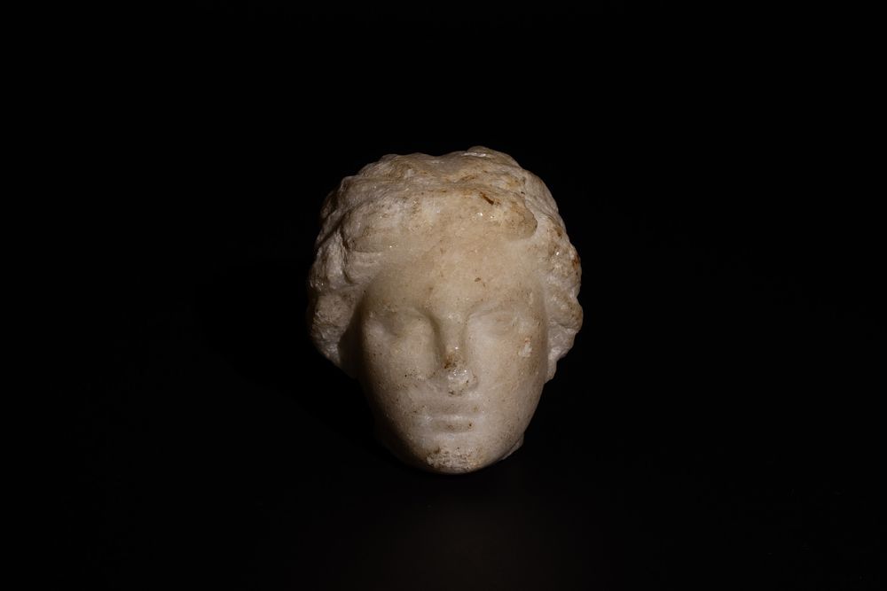 Lot 231: A Roman Alabaster/ Marble Head of a Young...