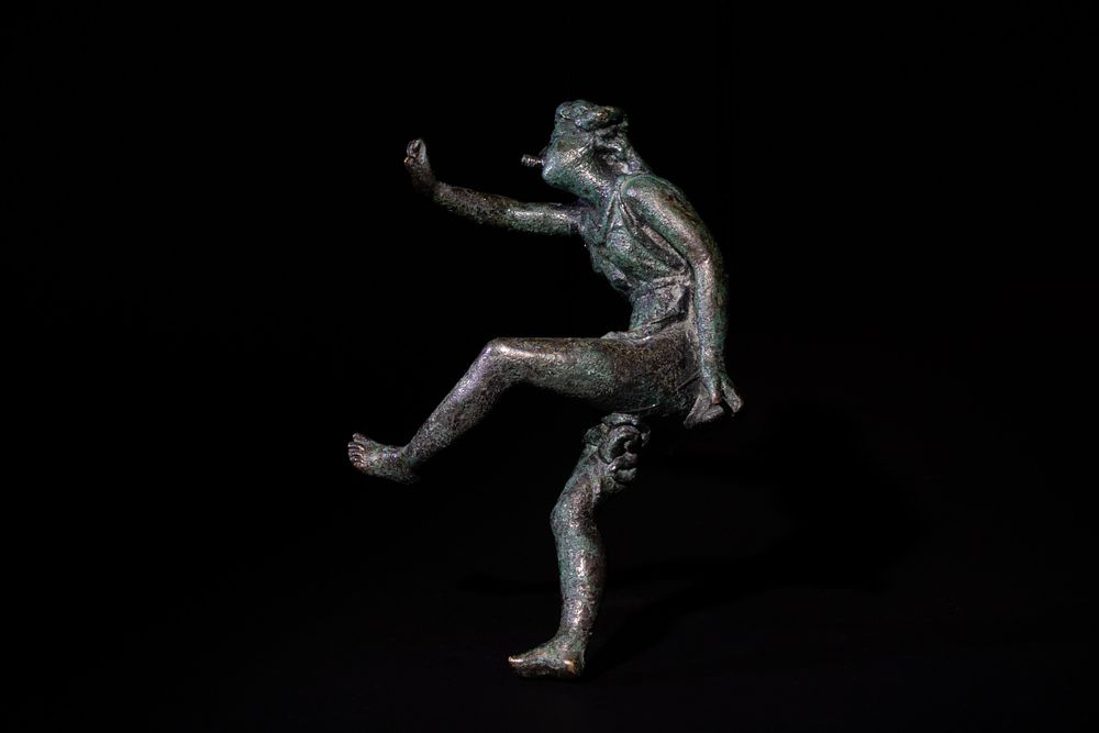 Lot 236: An Roman Bronze Figure of a Dancing Man...