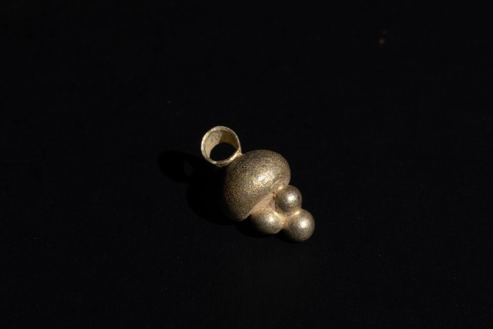 Lot 250: A Near Eastern Electrum Grape-Like Pendant, Circa 1st...