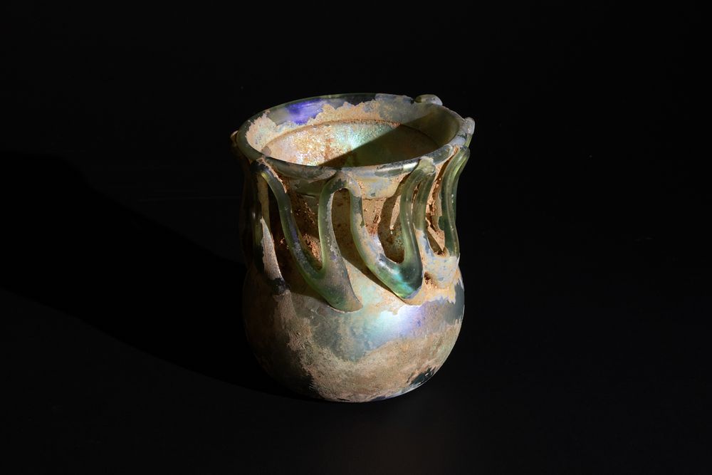 Lot 255: A Rare Roman Glass Bottle with Lovely Patina,...