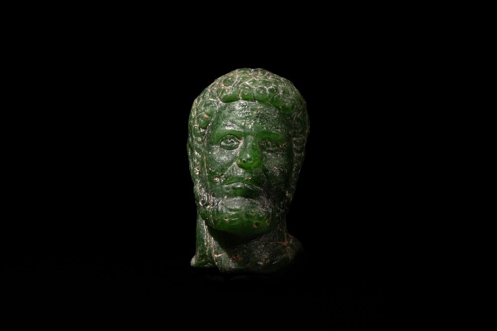Lot 260: A Roman Green Stone Bust of a Roman...