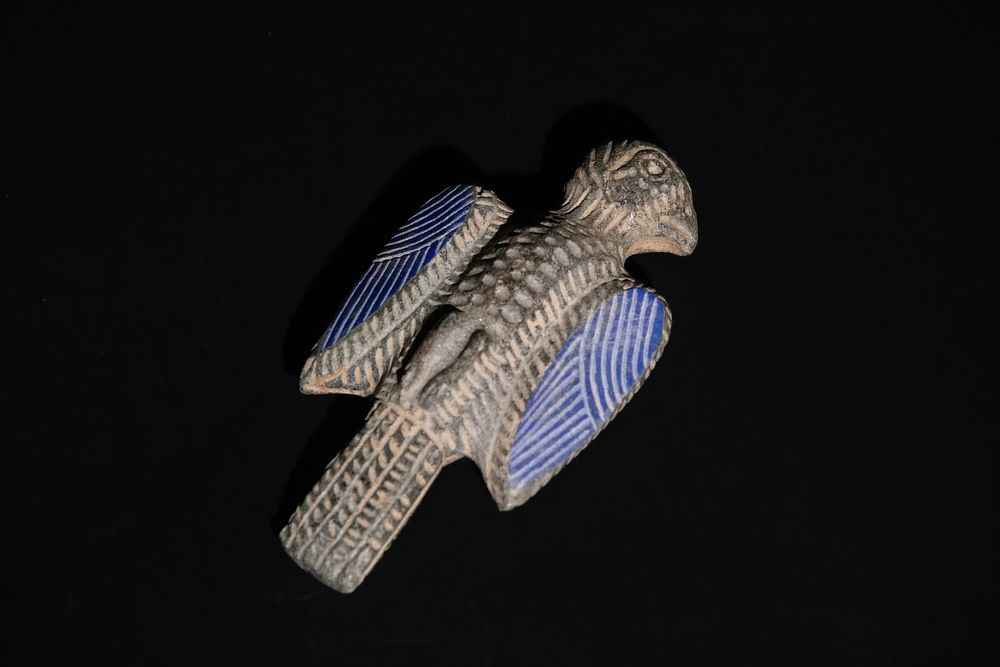 Lot 268: A Bactrian Steatite Falcon with Lapis Lazuli Inlay,...